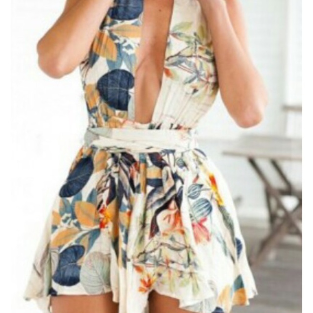 Wrap around floral romper. Moving out clearance
